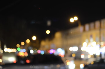 Blurred view of night city street