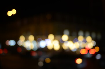 Blurred view of night city street