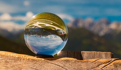 Crystal ball alpine summer landscape shot at Serles cable car station, Mieders, Stubaital valley,...