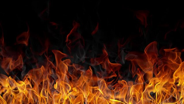 Super Slow Motion Shot of Real Fire Background Isolated on Black at 1000fps.