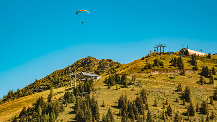 Alpine summer view with paragliders at Lake Spiegelsee, Mount Fulseck, Dorfgastein, St. Johann im...