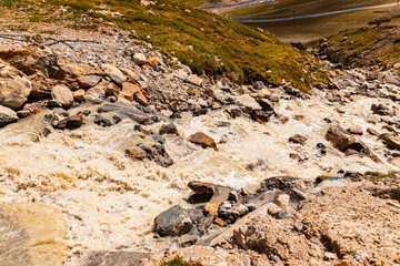 Alpine summer view with a mountain stream near Dresdnerhuette, Mutterbergalm, Stubaital valley, Innsbruck, Tyrol, Austria