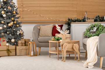 Interior of festive open space kitchen with Christmas decorations