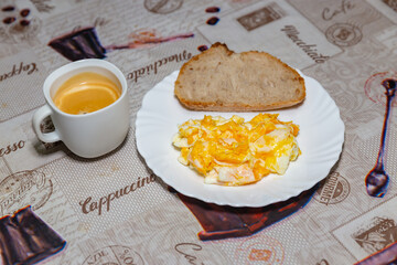 Healthy breakfast, eggs, naturally fermented bread, banana and unsweetened coffee