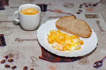 Healthy breakfast, eggs, naturally fermented bread, banana and unsweetened coffee