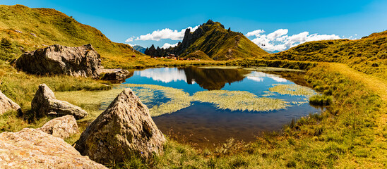 High resolution stitched alpine summer panorama with reflections at Schlossalmbahn cable car, Mount...