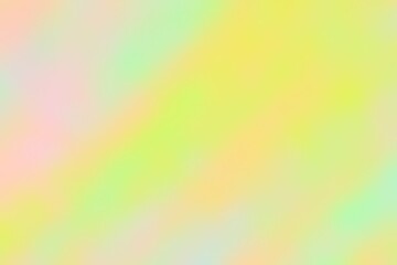 Abstract blurred background image of green, yellow colors gradient used as an illustration. Designing posters or advertisements.