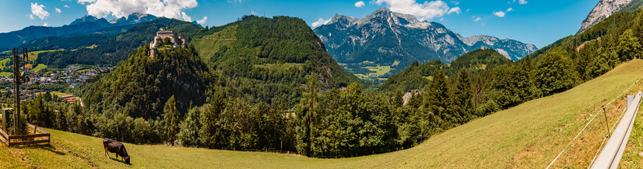 High resolution stitched alpine summer panorama with fortress Hohenwerfen at Werfen, Pongau, Salzburg, Austria