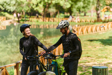 Fototapeta premium A blissful couple, adorned in professional cycling gear, enjoys a romantic bicycle ride through a park, surrounded by modern natural attractions, radiating love and happiness