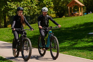 A blissful couple, adorned in professional cycling gear, enjoys a romantic bicycle ride through a...