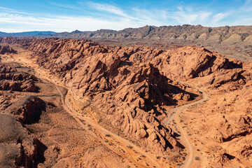Fototapeta na wymiar Aerial view of a southern Nevada State and National park that looks like an alien planet with jagged red rock