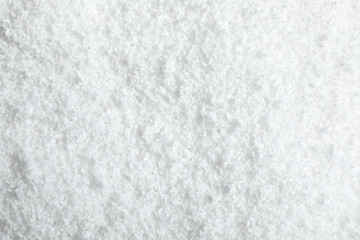 Pile of white snow as background, top view