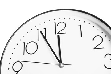 Clock showing five minutes until midnight on white background, closeup. New Year countdown