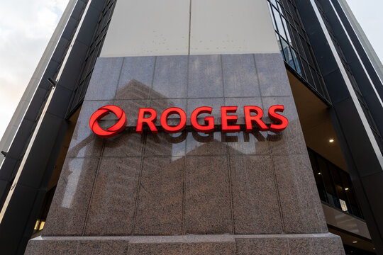 Rogers logo sign on its corporate office building in Altius Centre, Calgary, Alberta, Canada, on July 3, 2023. Rogers Communications Inc. is a Canadian communications and media company.