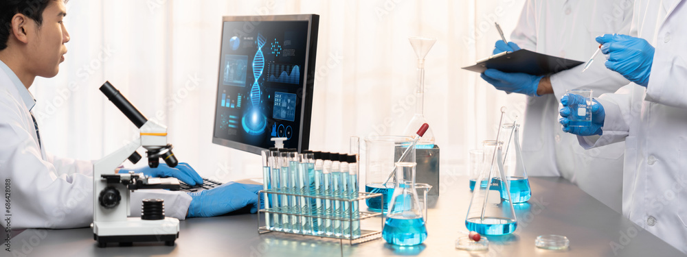 Poster dedicated scientist group working on advance biotechnology computer software to study or analyze dna