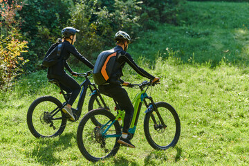 A blissful couple, adorned in professional cycling gear, enjoys a romantic bicycle ride through a park, surrounded by modern natural attractions, radiating love and happiness