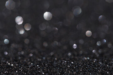 Glitter vintage lights background, light silver and black
