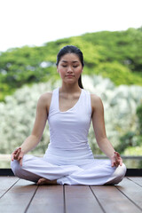 Fototapeta na wymiar Woman performing yoga