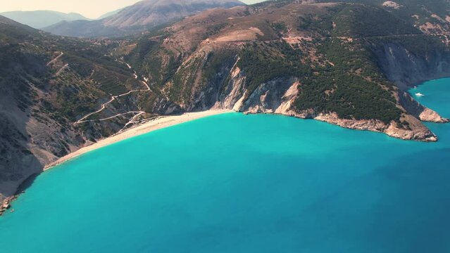 Flying over Myrtos beach, Kefalonia, during the summer, Greek Ionian Islands.