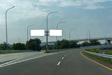 Blank overhead freeway directional sign. copy space. Blank road sign at the highway