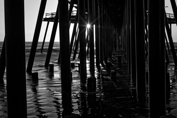 silhouette of a pier