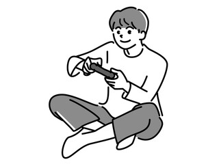 あぐらをかいてゲームをする男の子　PNG