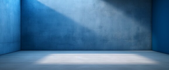 Blue concrete wall and floor with light and shadow backgrounds, use for product display for presentation and cover banner design
