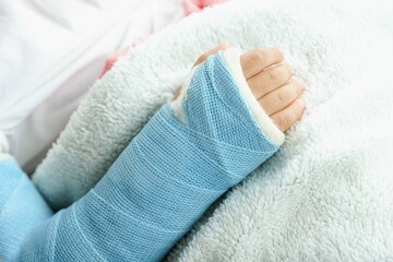 Children hand bone broken from accident with arm splint