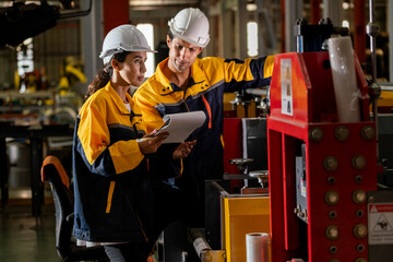 Professional quality control inspector conduct safety inspection on steel machinery and...