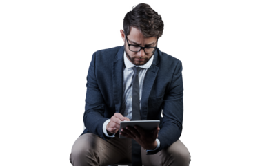 Businessman, tablet and internet on chair for research, message or email for reading, browse or scroll. Male entrepreneur, person and glasses with technology on isolated or transparent png background