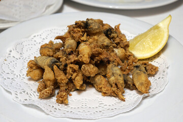 Close up Calamares Chopitos Fritos, Deep fried and battered baby squid