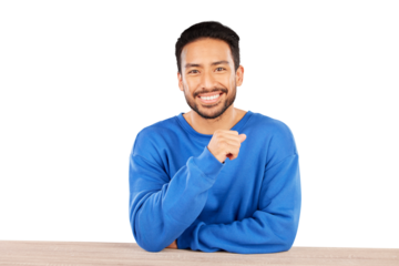 Portrait, smile and casual with a young indian man sitting at a table isolated on a transparent background. Face, desk and a happy confident person in a blue jersey on PNG with a positive mindset