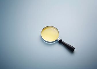 A magnifying glass isolated on grey background