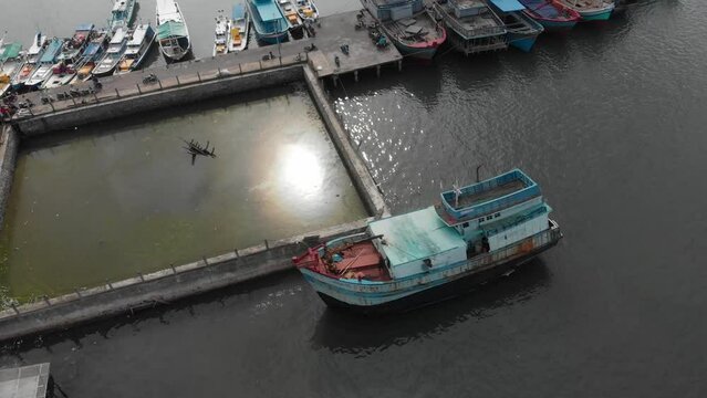 Harbour of tanjung pandan at Belitung Indonesia with big fishing boat, aerial