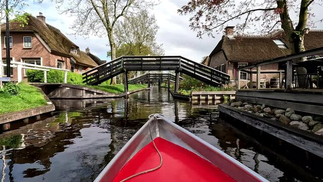 Boat trip in Giethoorn the Netherlands. Beautiful village Holland.