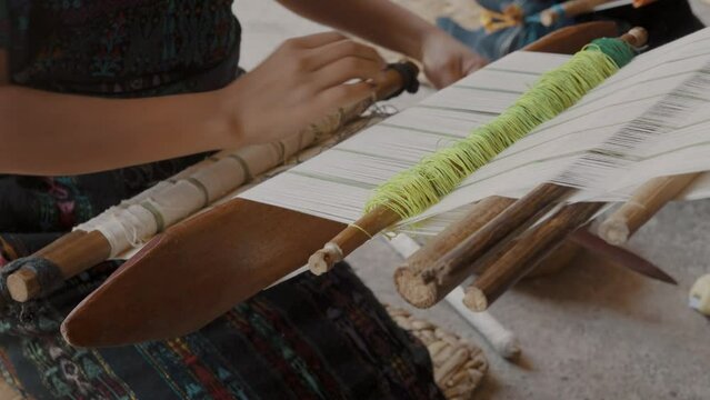 Mayan Woman Weaving Traditional Textiles In Guatemala - Close Up