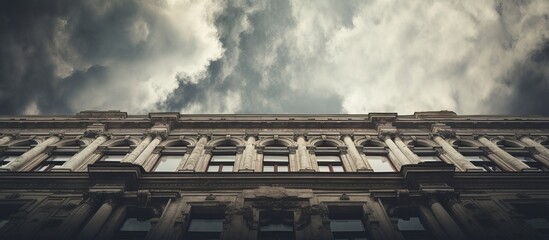 Vintage building seen under cloudy sky