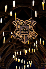Fototapeta premium JAPAN - Nov 13, 2023: The Food Hall signage logo with lamp lights decoration in Hogwarts Wizarding World at Warner Bros. Studio Tour Tokyo, The Making of Harry Potter