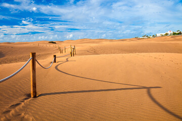 fencing dangerous quicksand in a desert landscape