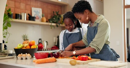 Home, cooking and black family with mother, girl and love with food, bonding together and lunch. Parent, mama or kid with ingredients, learning or teaching with childhood development, kitchen or meal - Powered by Adobe