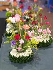 Krathongs made from banana leaves decorated with flowers during the Loy Krathong festival