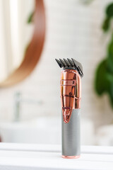 Electric shaver for men in a bathroom close up