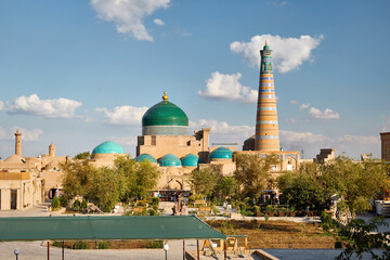 Fototapeta na wymiar Mausoleum of Pahlavan Mahmoud and minaret in Khiva