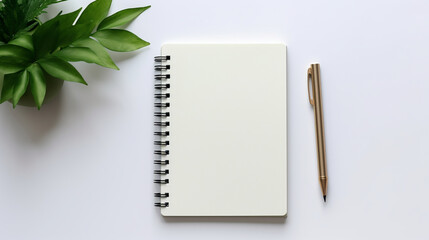 Top view of spiral notepad with gold pen on white table background mockup for text wording space design