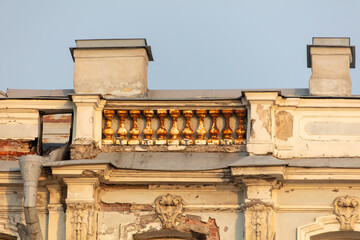 Rusty columns on the roof of a house