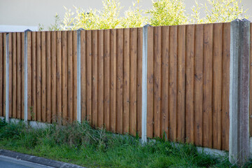 wall street wooden barrier and fence around the house protect home