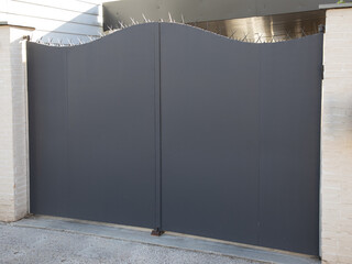 portal grey dark home steel door metal gate with aggressive protection against burglar intrusion