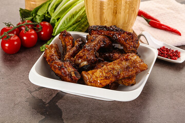 Grilled pork ribs in barbecue sauce