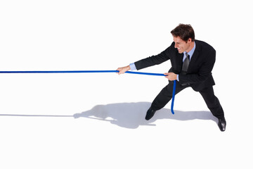 Businessman, conflict and tug of war by white background, career challenge and workplace competition. Young person, mental health and professional worker with rope, top view and job battle in studio - obrazy, fototapety, plakaty
