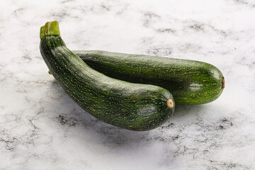 Raw young small green zucchini